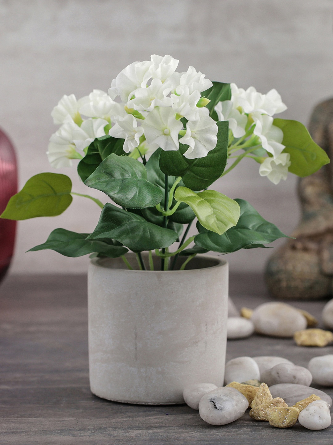

Pure Home and Living White & Green Artificial Petunia Plant In Cement Pot