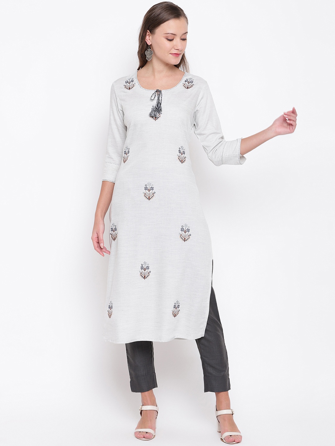 

Vbuyz Women White Floral Embroidered Regular Kurta with Trousers