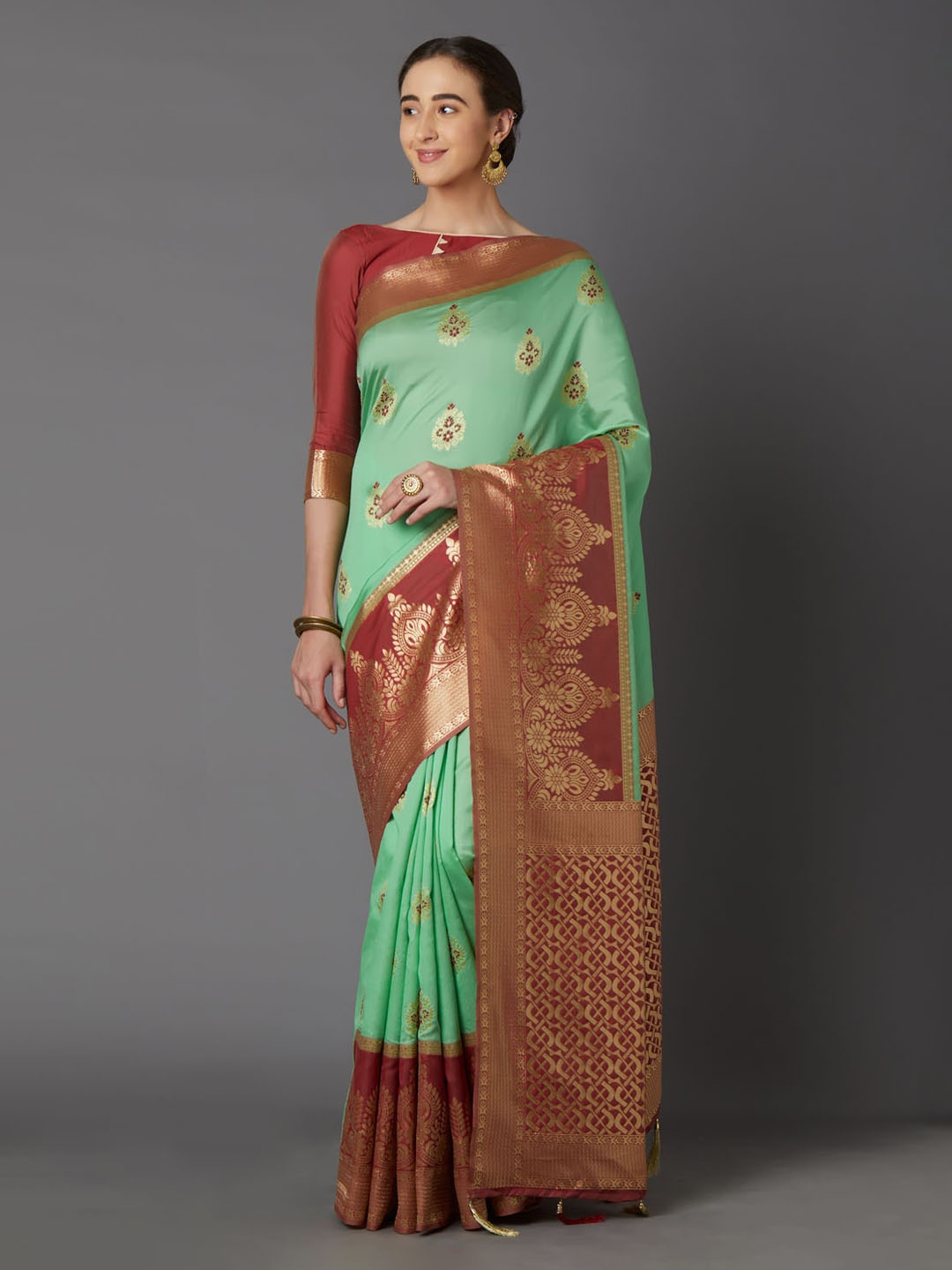 

Mitera Mint Green & Brown Silk Blend Woven Design Kanjeevaram Saree