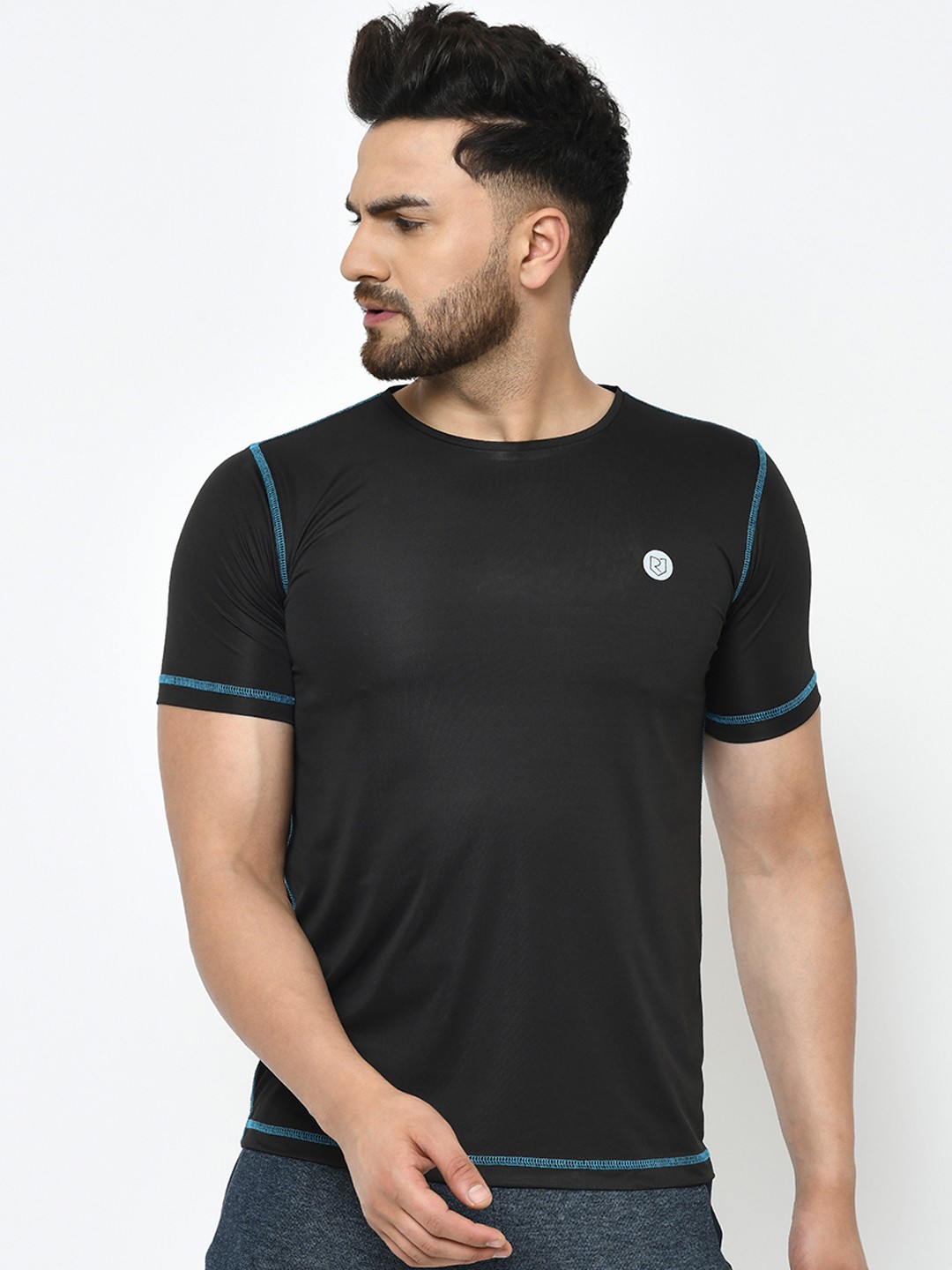 

Rigo Men Black Solid Round Neck T-shirt