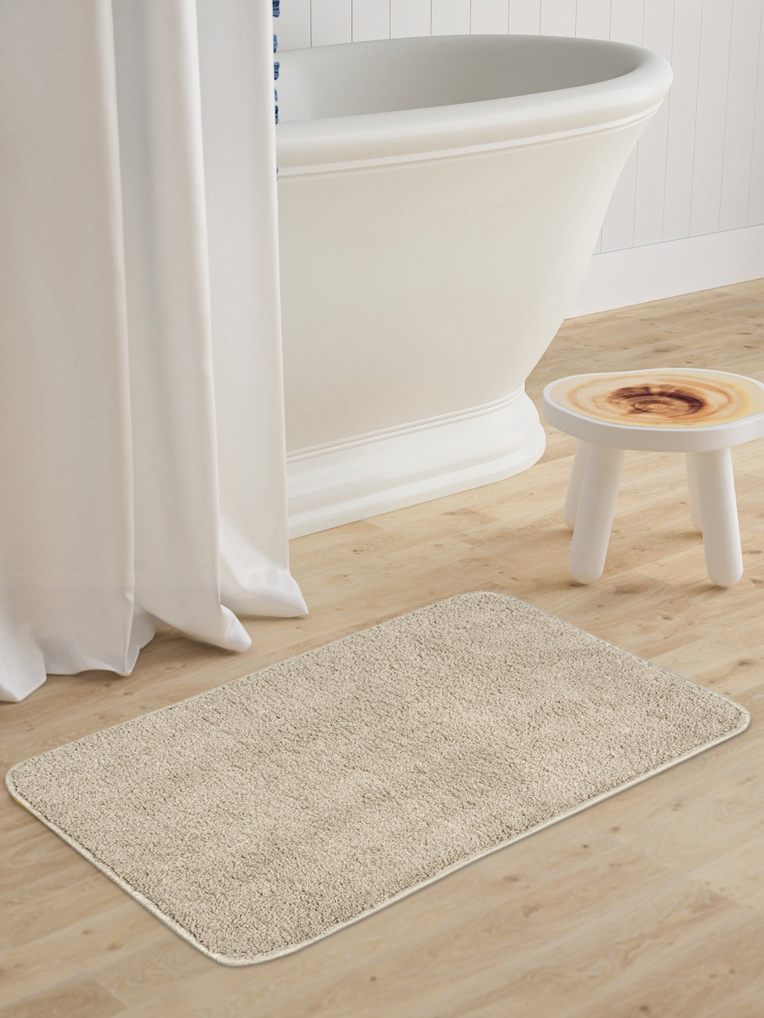 

Saral Home Beige Neo Shaggy Yarn Microfibre Anti-Skid Bath Mat