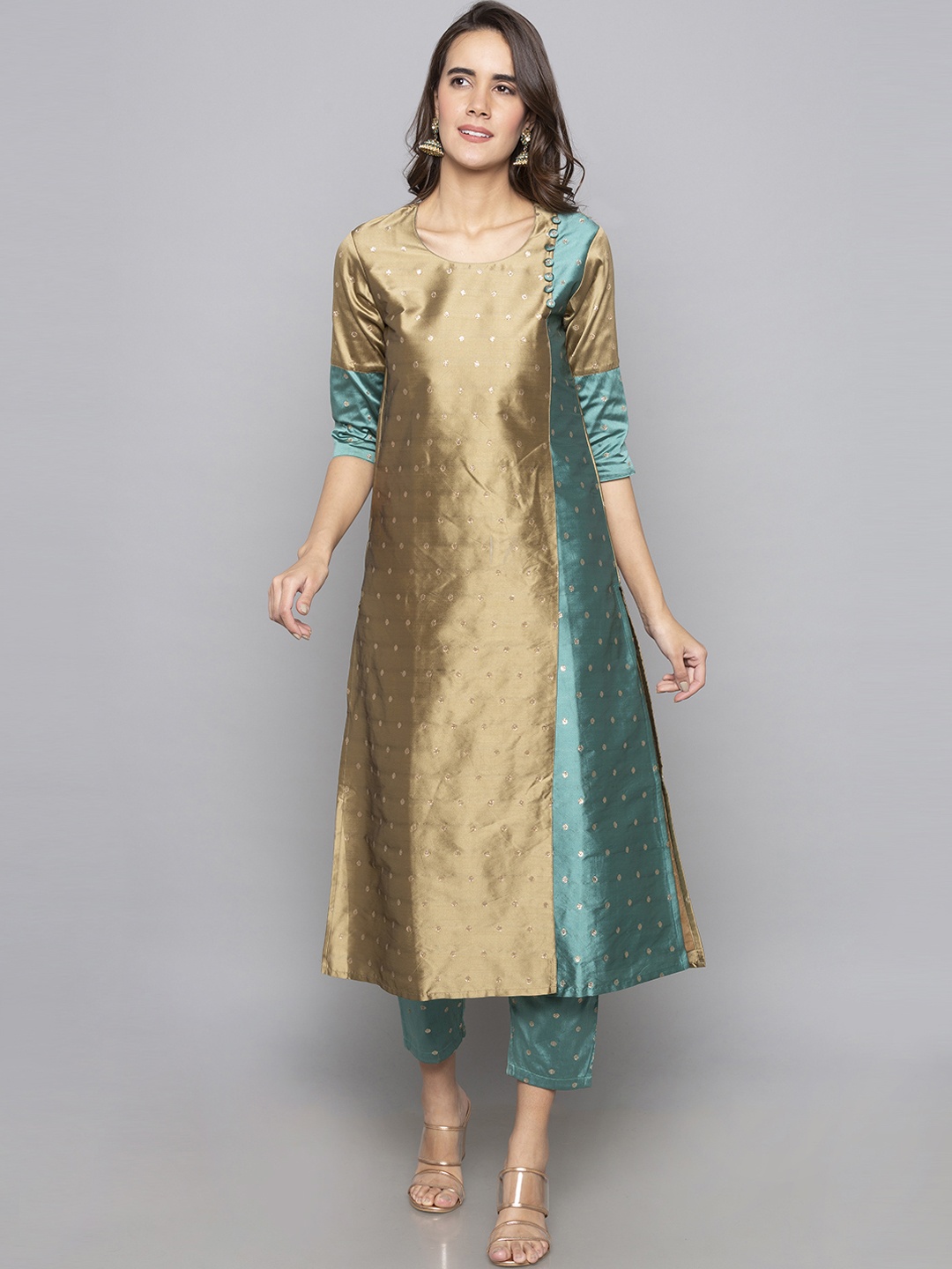 

Desi Weavess Women Beige & Teal Green Woven Design A-Line Kurta