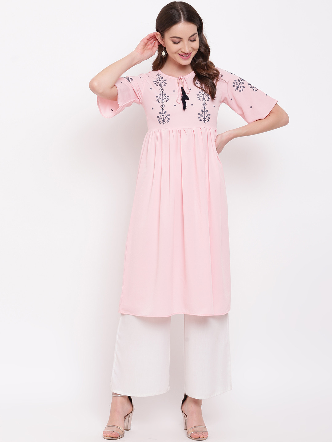 

Napra Women Pink Printed Kurta with Palazzos