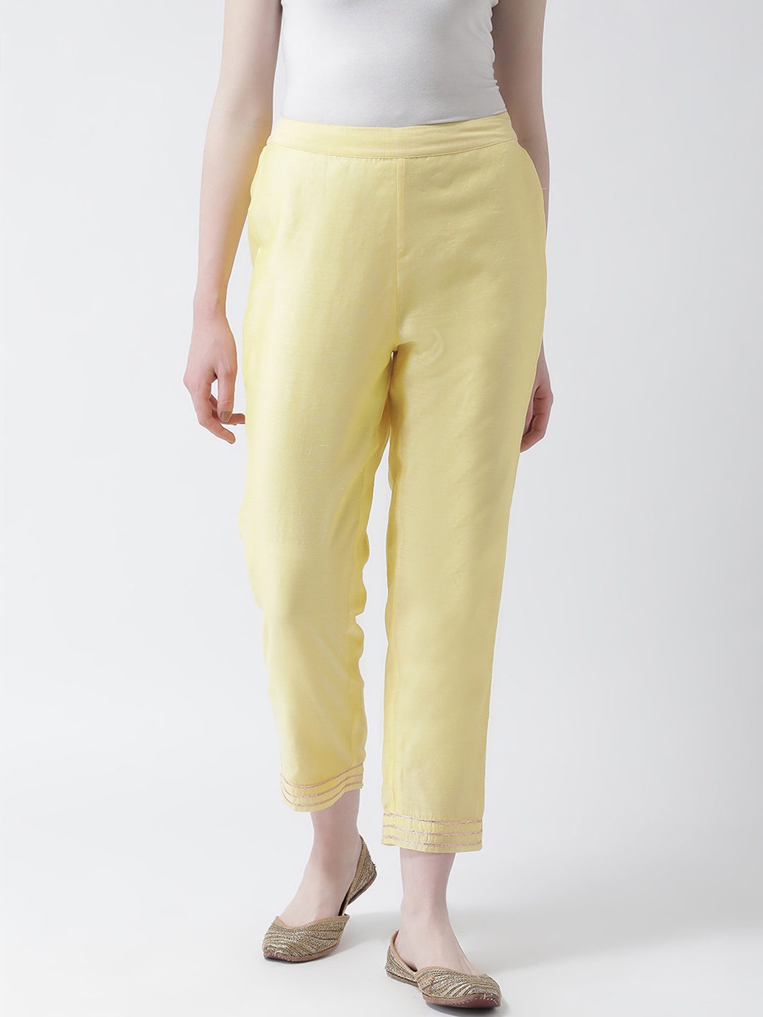 

Aayna Women Yellow Regular Fit Solid Cigarette Trousers