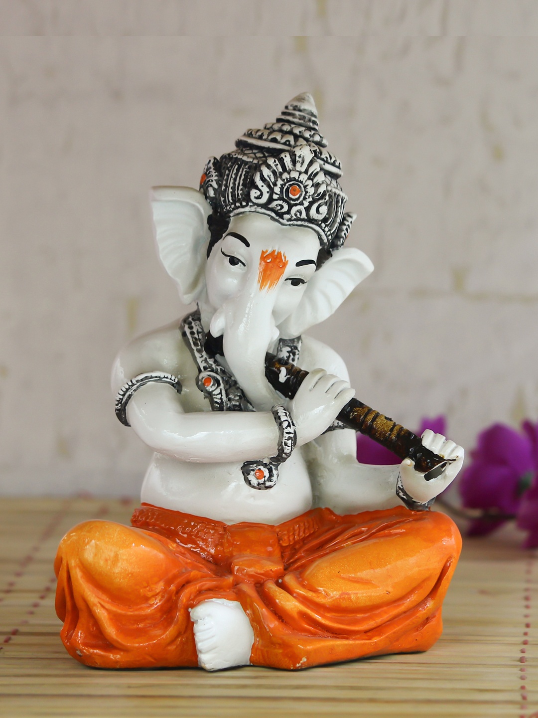 

eCraftIndia White & Orange Lord Ganesha Playing Flute Showpiece