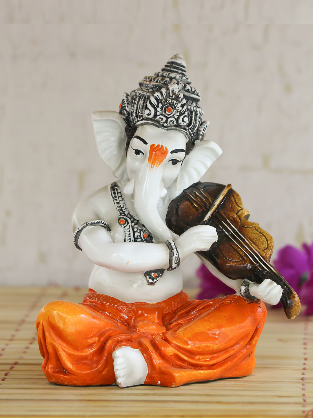 

eCraftIndia White & Orange Lord Ganesha playing Violin Showpiece