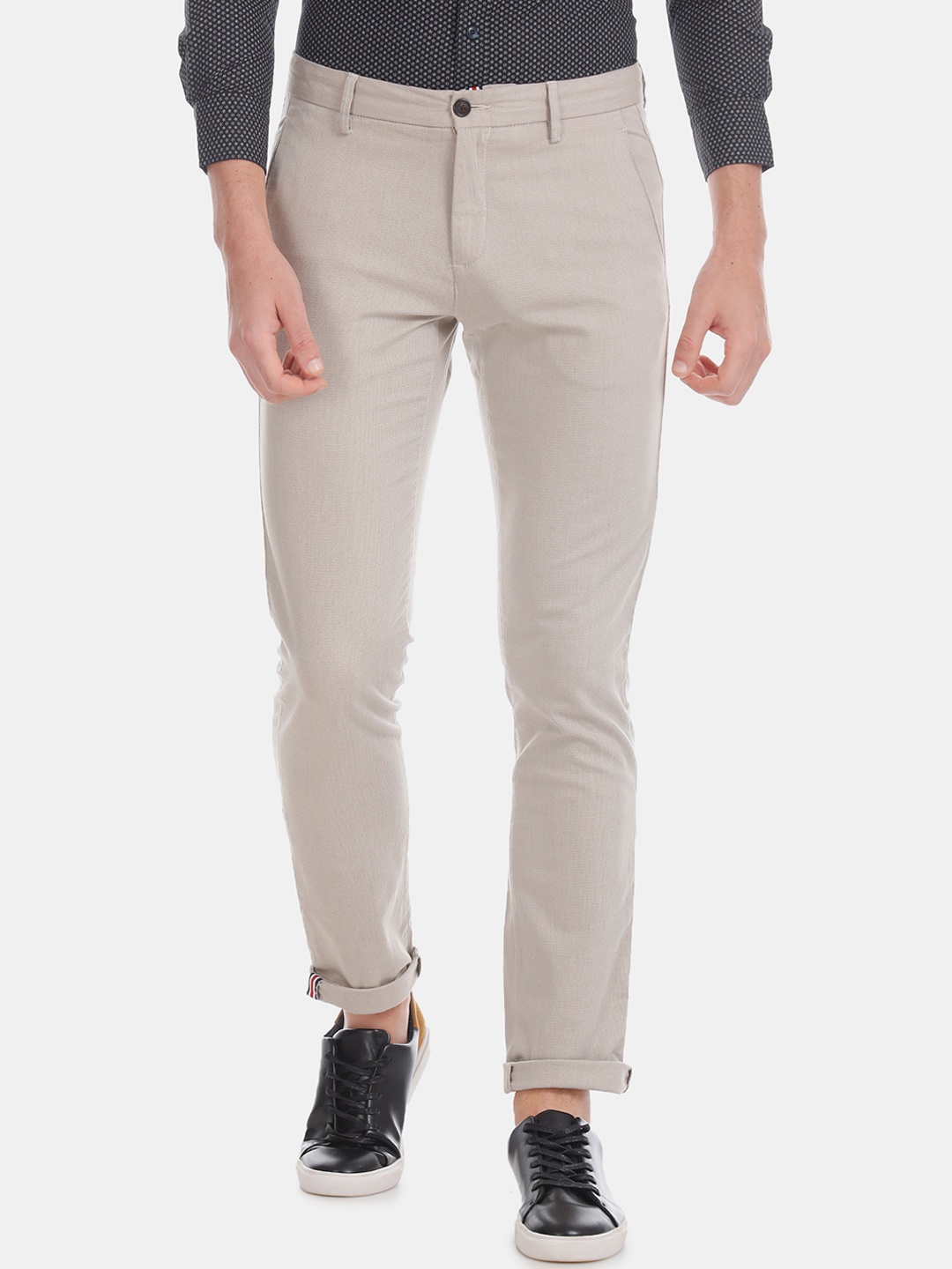 

Arrow Sport Men Beige Slim Fit Solid Regular Trousers
