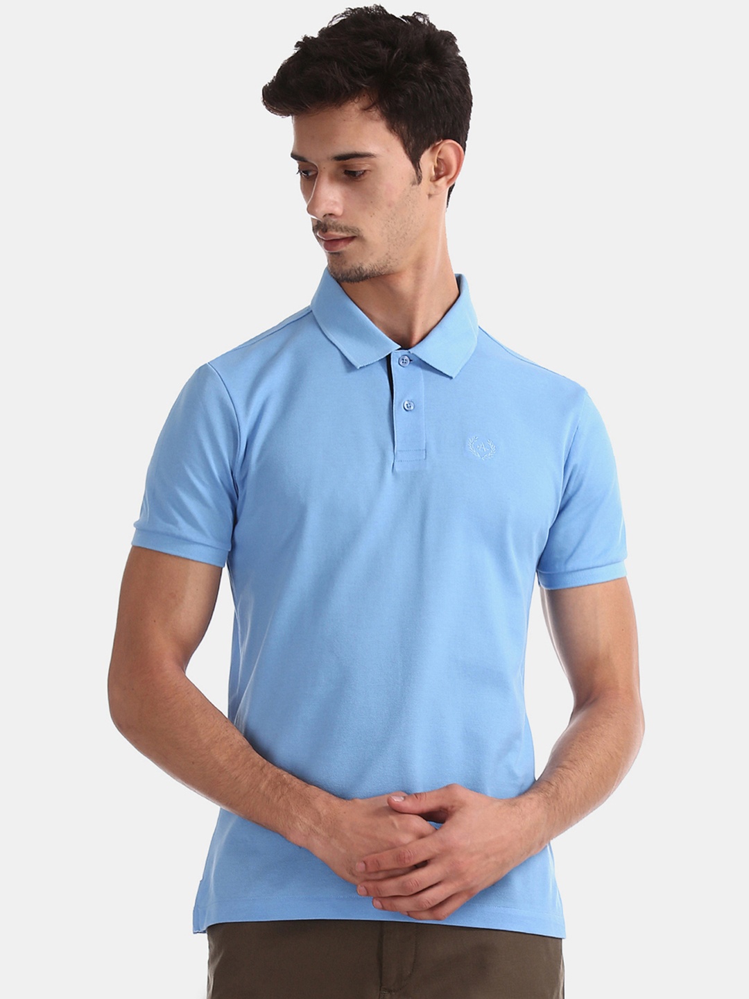 

Arrow Sport Men Blue Solid Polo Collar T-shirt