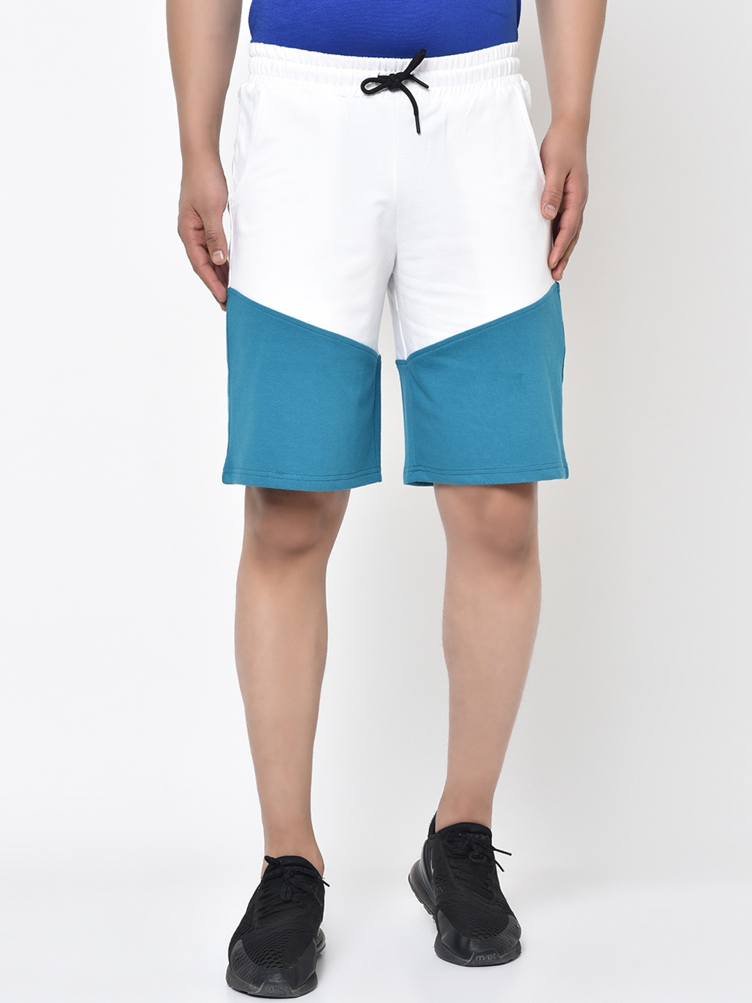

Aesthetic Bodies Men Teal Solid Regular Fit Regular Shorts