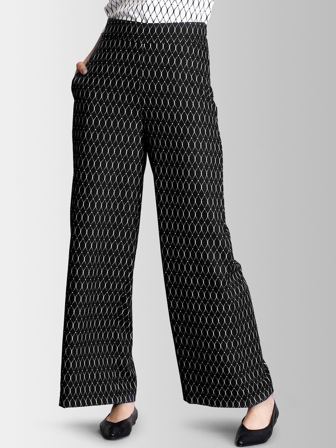 

FableStreet Women Black & White Flared Printed Parallel Trousers