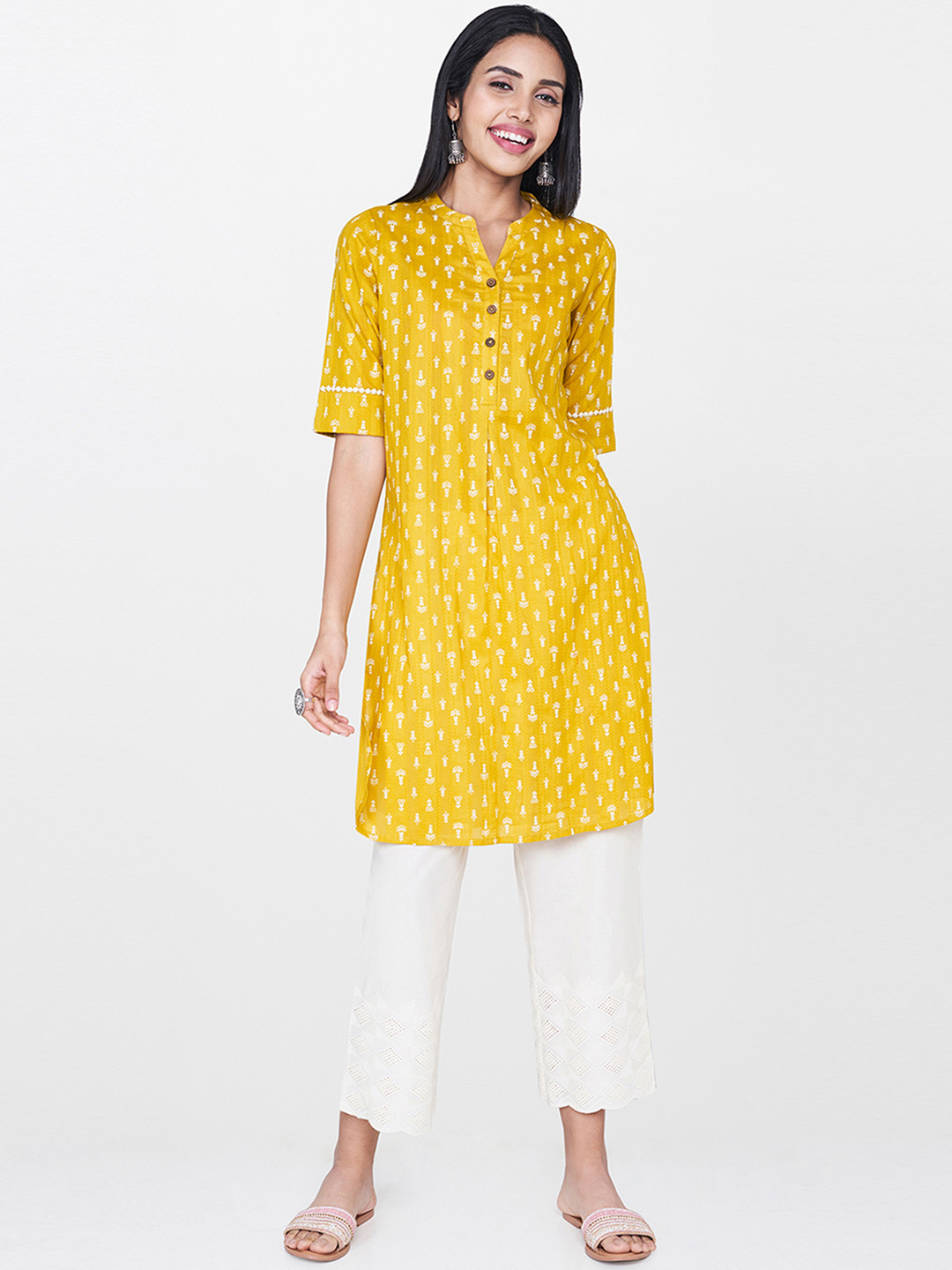 

Global Desi Women Yellow Printed Tunic