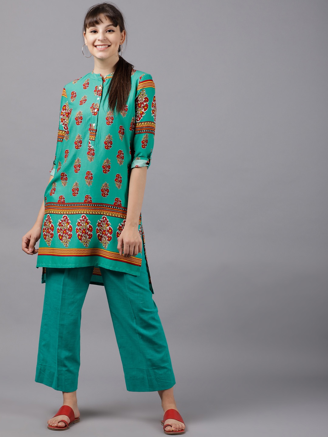 

Vishudh Women Turquoise Blue & Red Printed Straight Kurta