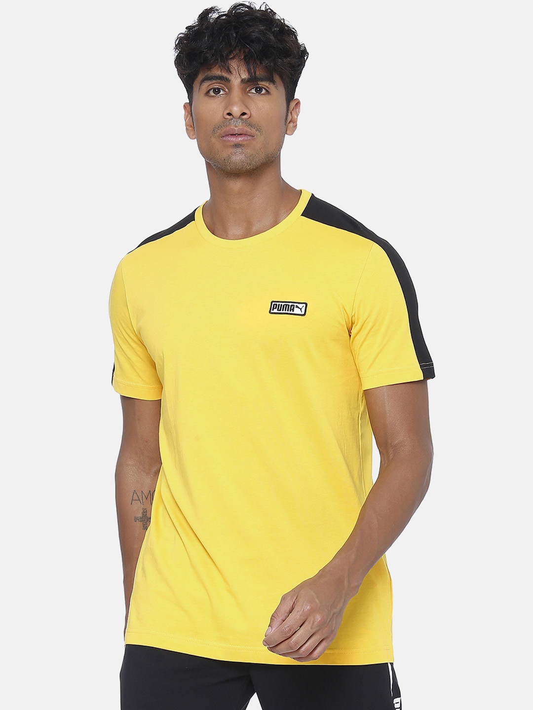 

Puma Men Yellow Solid Round Neck T-shirt