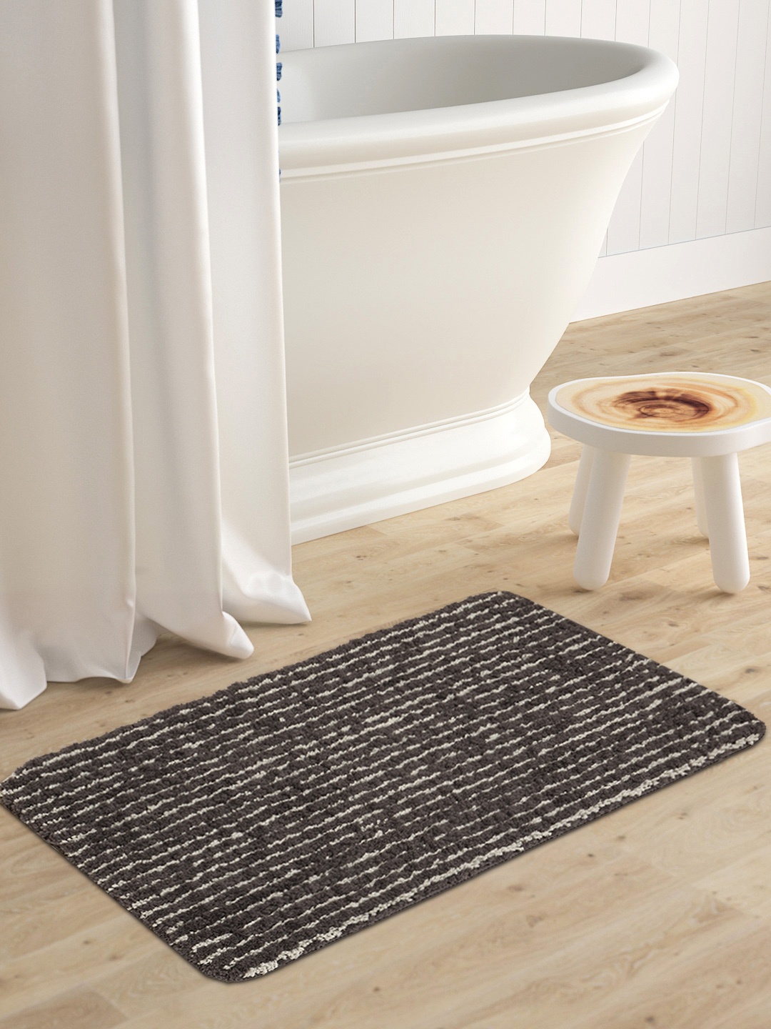 

Saral Home Black & Grey Striped Furry Soft Microfiber Anti-Skid Bathmat