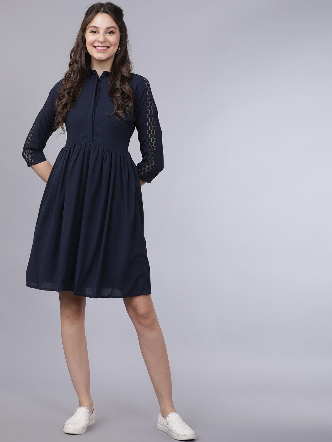 

Tokyo Talkies Women Navy Blue Solid Fit and Flare Dress
