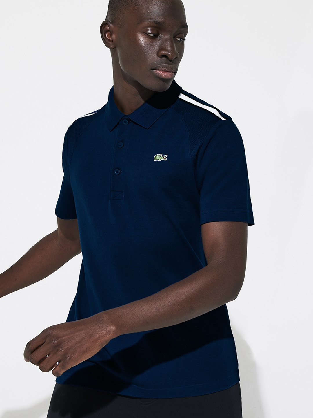 

Lacoste Men Navy Blue Solid Polo Collar Pure Cotton T-shirt