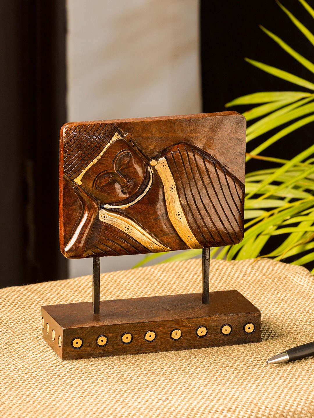 

ExclusiveLane Brown & Gold-TonedResting Buddha Hand Carved Wooden Showpiece