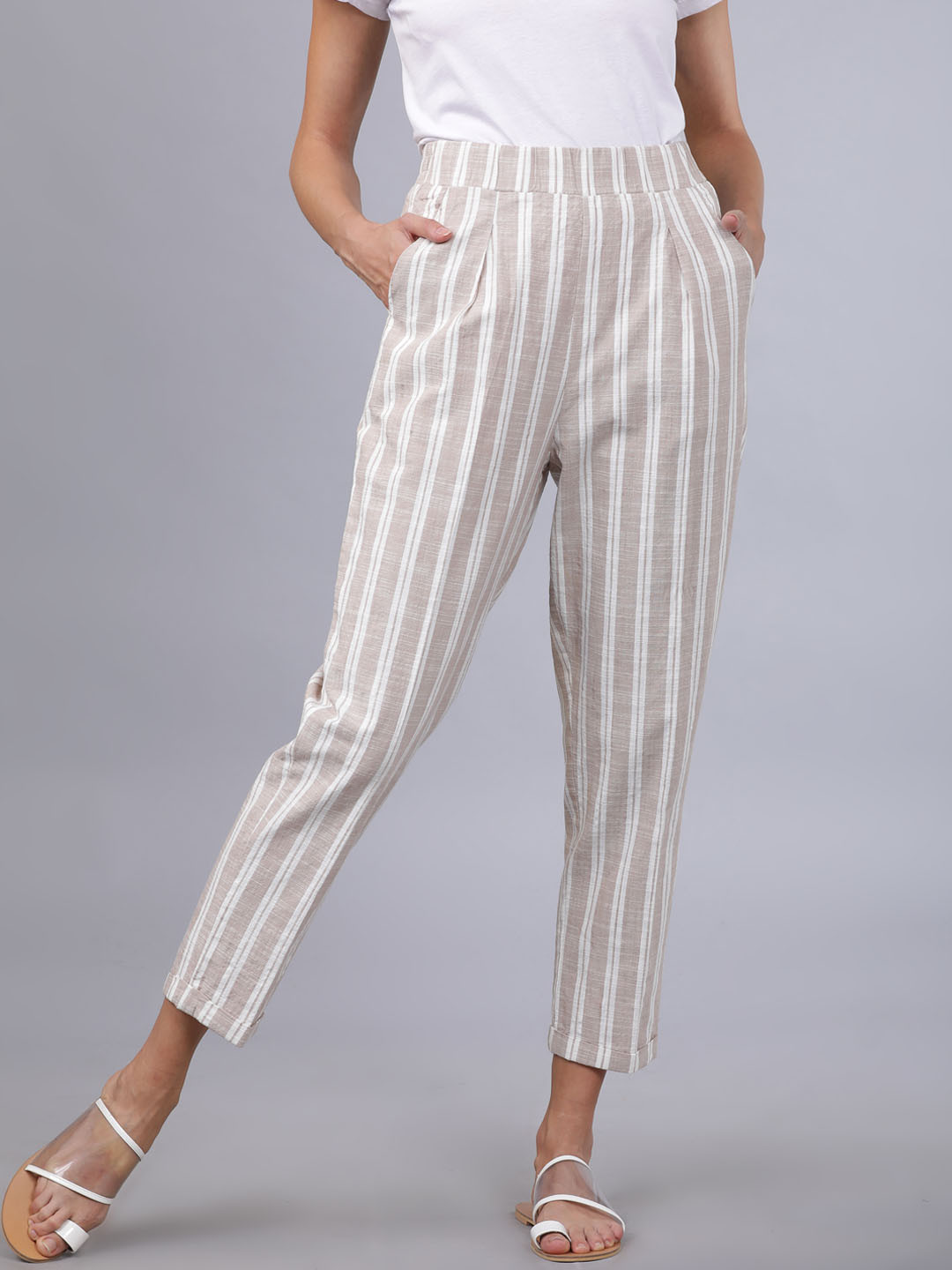 

Tokyo Talkies Women Beige & Off-White Regular Fit Striped Regular Trousers