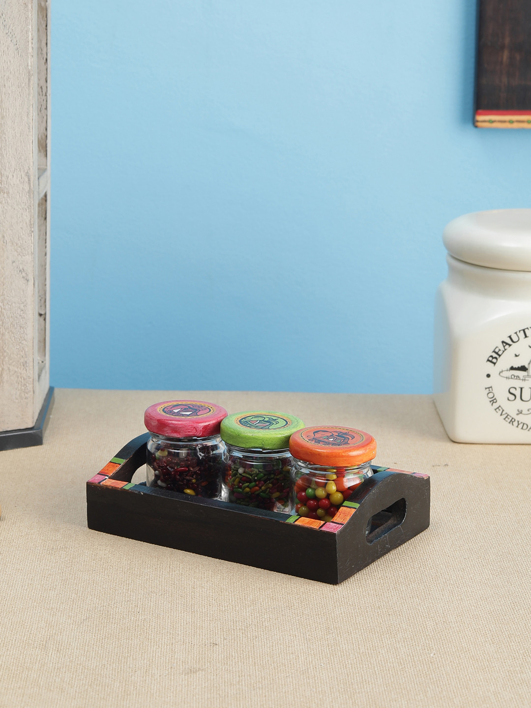 

VarEesha Set Of 3 Transparent Madhubani Hand-Painted Lid Glass Jars With Brown Mango Wood Tray