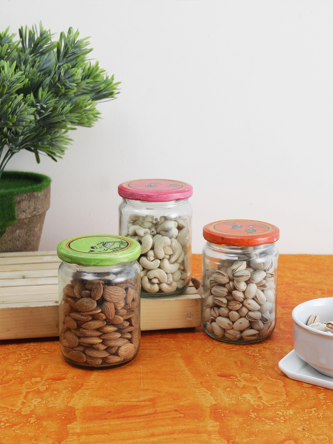 

VarEesha Set Of 3 Transparent Glass Jars With Madhubani Hand-Painted Lids