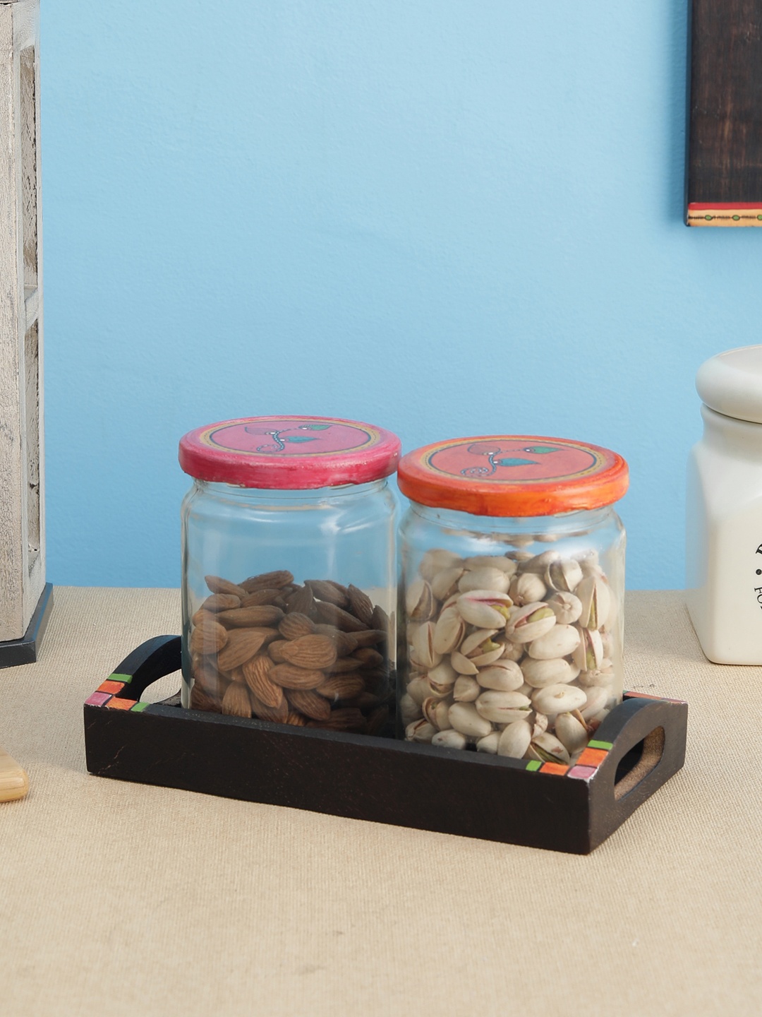 

VarEesha Set Of 2 Transparent & Brown Madhubani Hand-Painted Lid Glass Jars With Mango Wood Tray