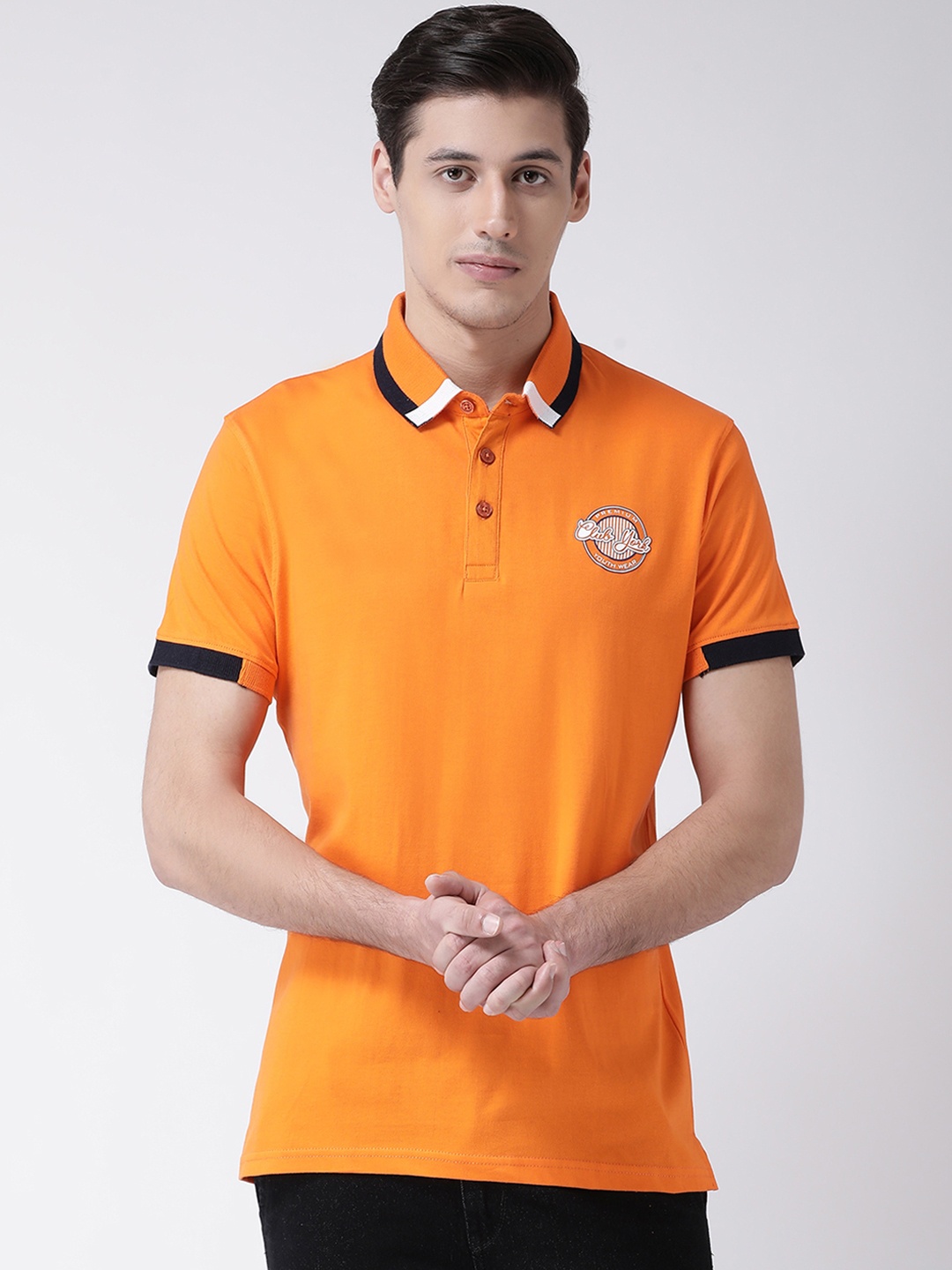

Club York Men Orange Solid Polo Collar T-shirt