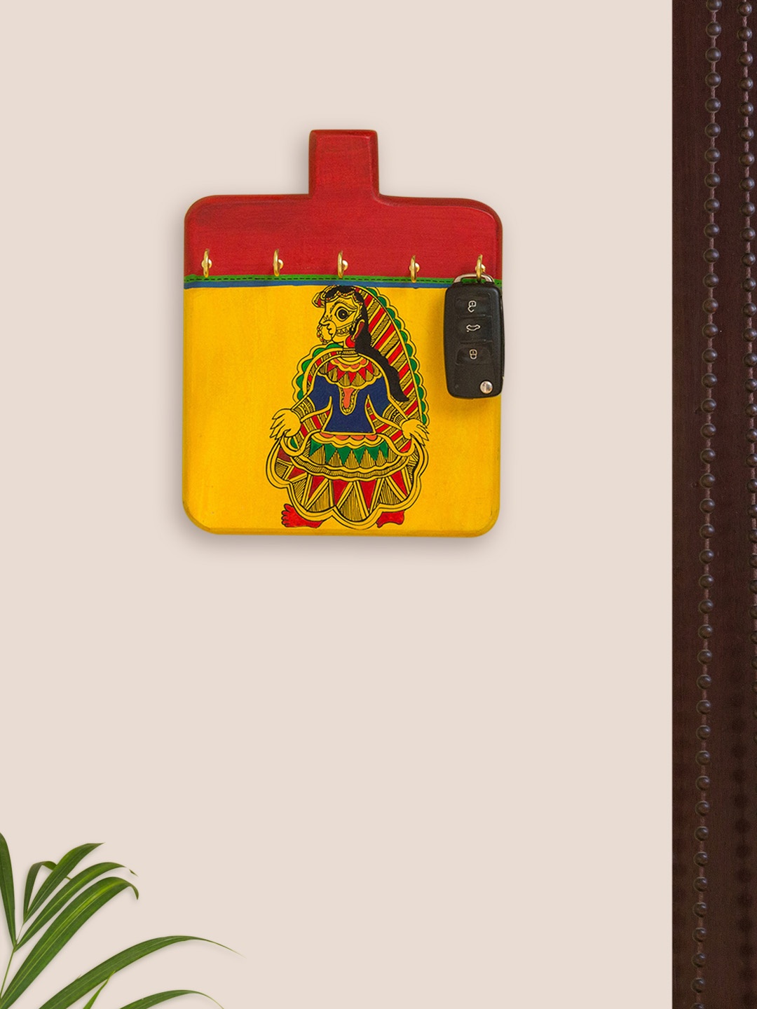 

ExclusiveLane Yellow & Red Hand-Painted Madhubani Lady Pine Wood Key Holder