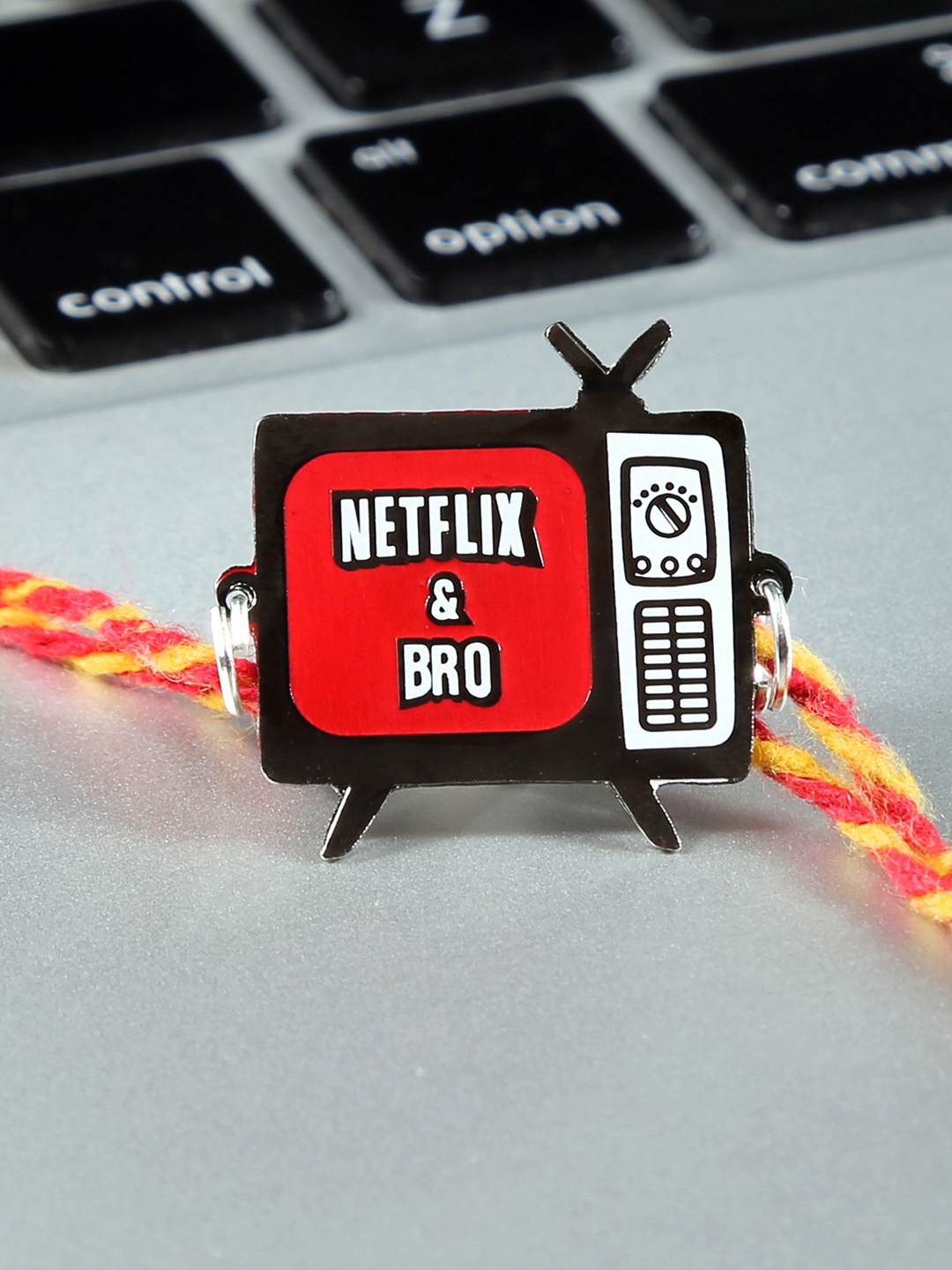 

Bigsmall Red & Black Brass-Plated Netflix & Bro Rakhi