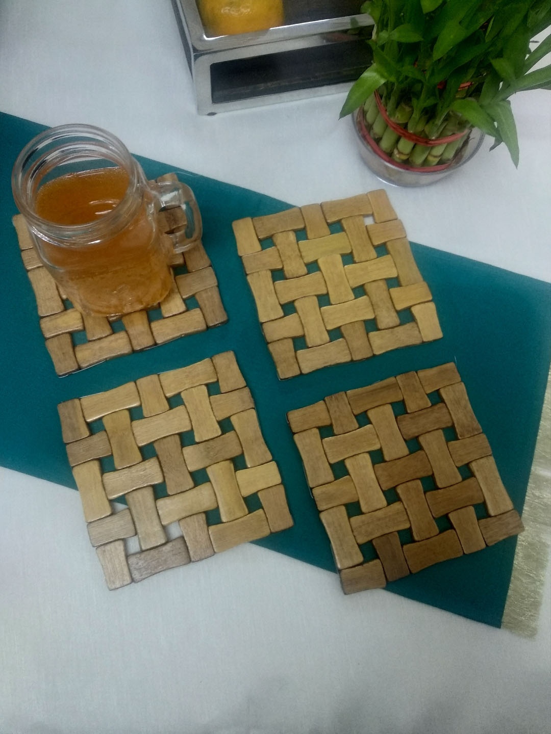

CRAYTON Unisex Set of 4 Brown Textured Square Puzzle Bamboo Coasters