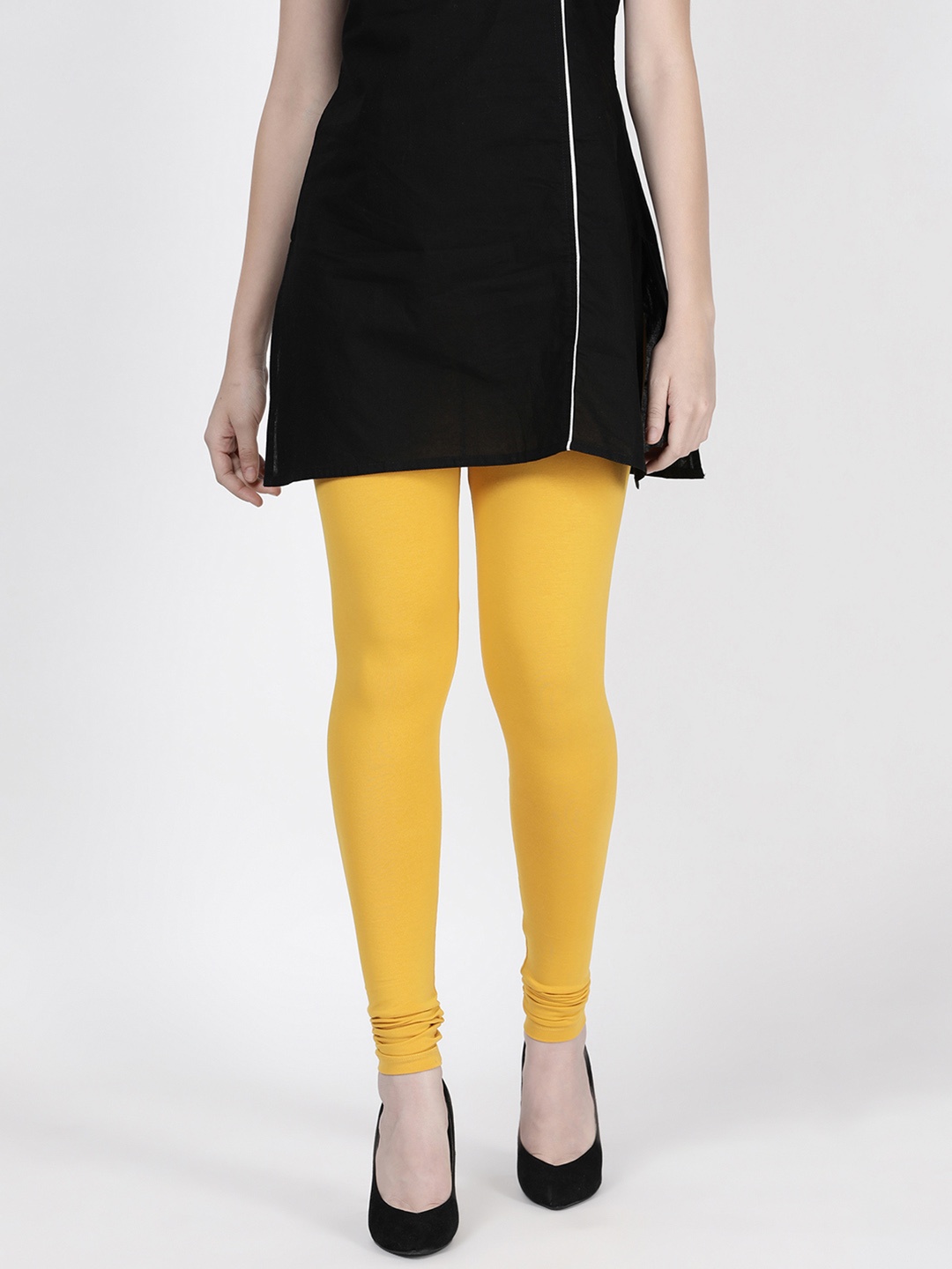 

TWIN BIRDS Women Yellow Solid Churidar-Length Leggings