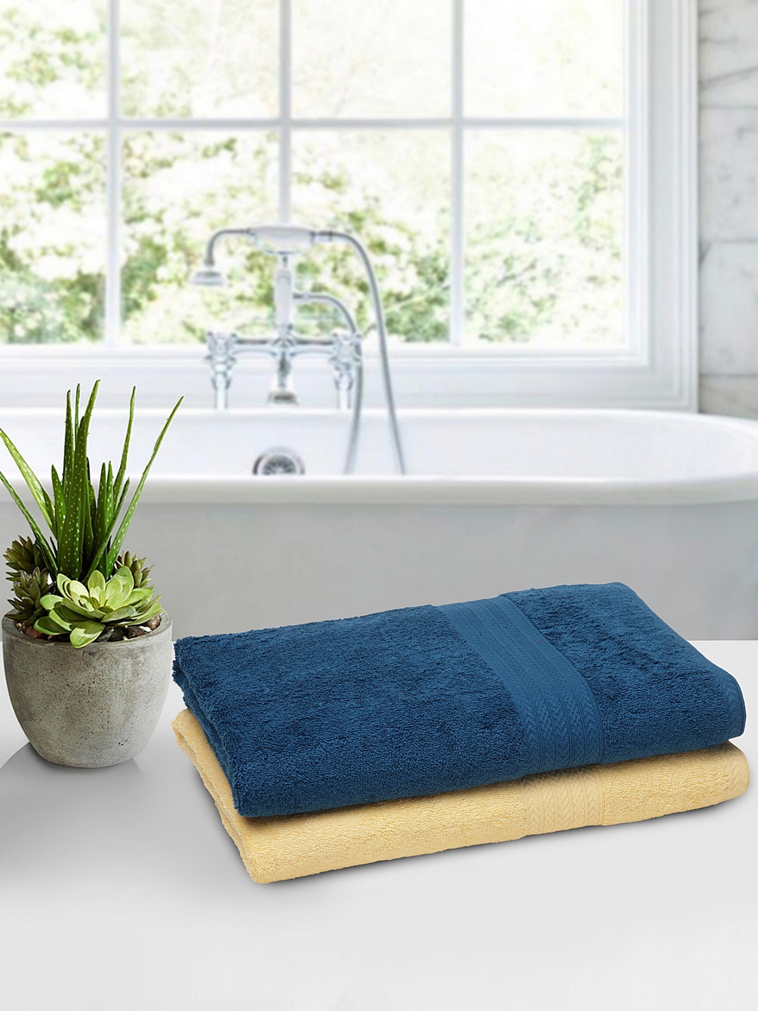 

BOMBAY DYEING Unisex Set Of Yellow & 2 Blue Solid Tulip 450 GSM Bath Towels