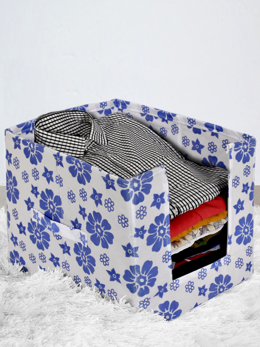 

Kuber Industries Blue & White Flower Printed Non-Woven Shirt Stacker Wardrobe Organizer