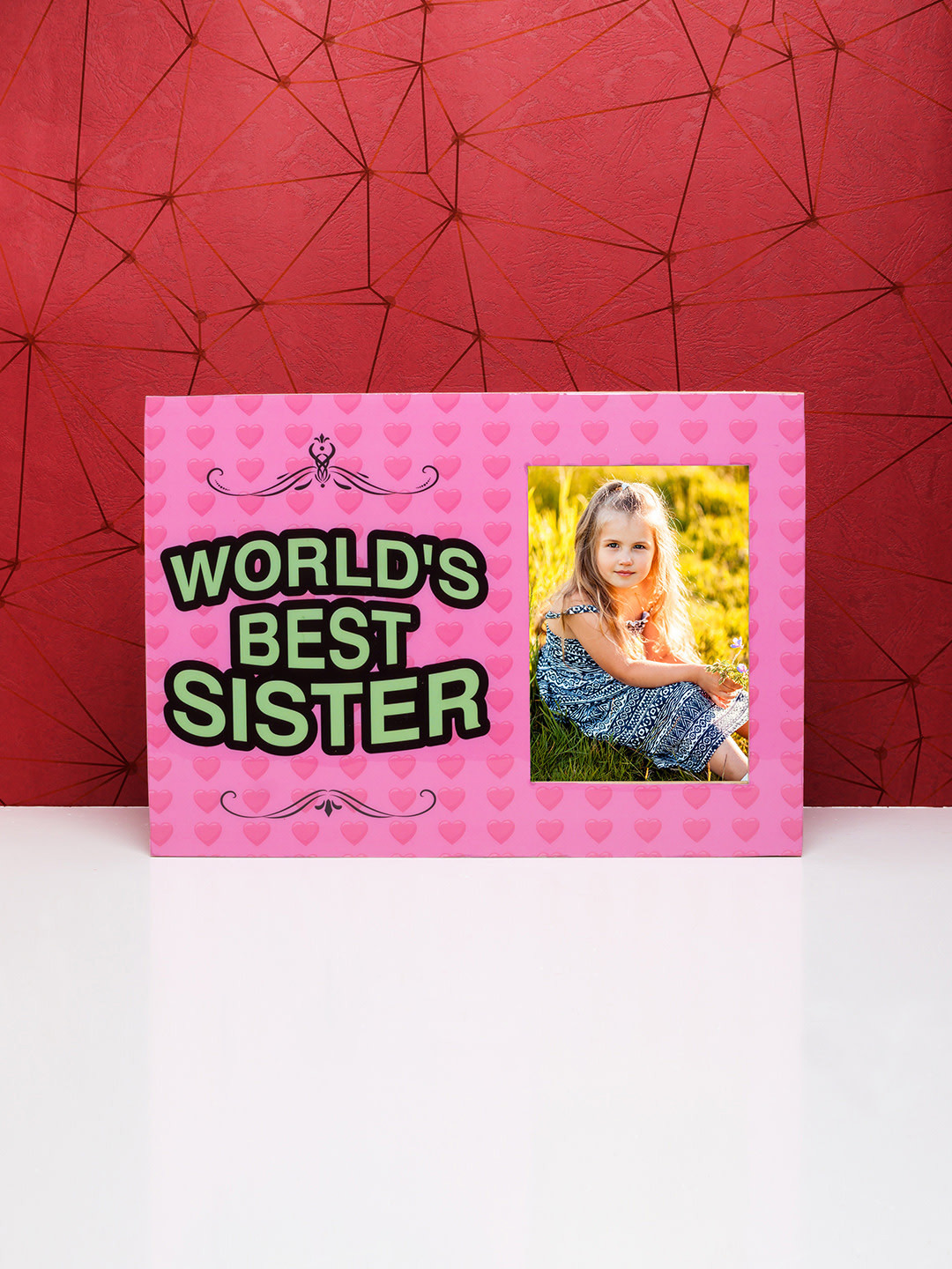 

Golden Peacock Pink & Yellow World's Best Sister Printed Wooden Table-Top Photo Frame