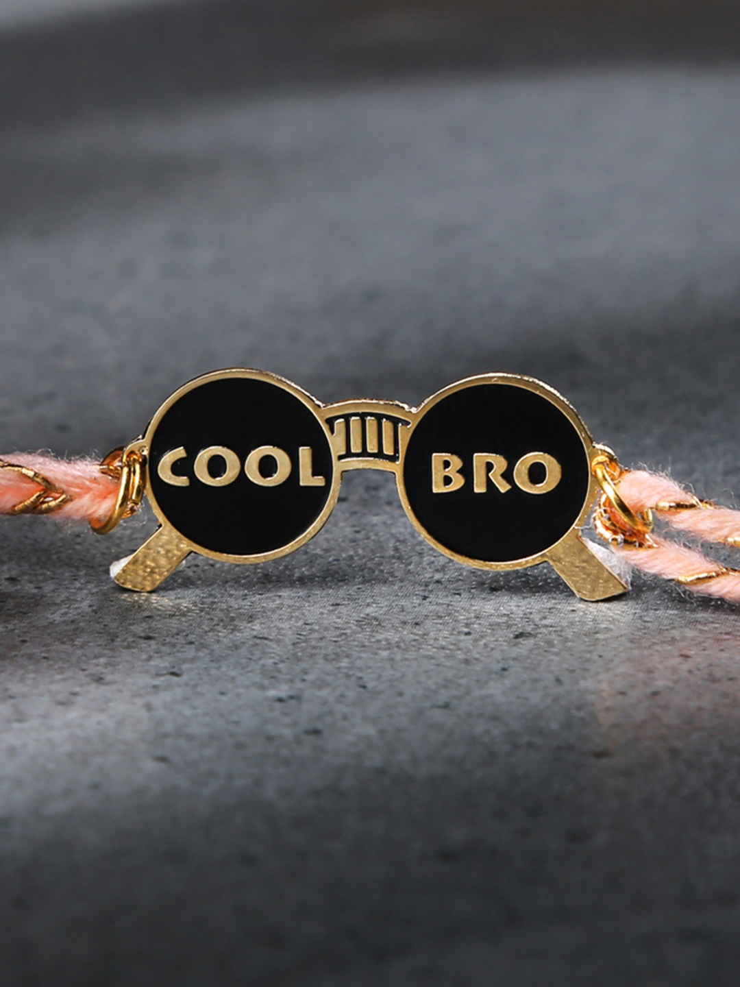 

Bigsmall Black & Gold Brass-Plated Cool Bro Rakhi