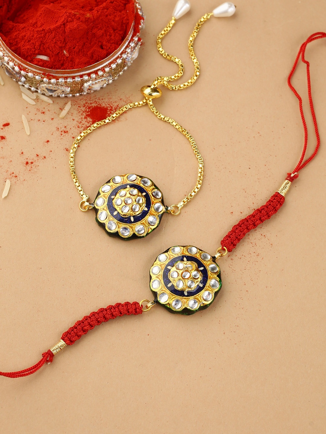 

Shoshaa Red & Blue Meenakari Kundan Studded Bhai Bhabhi Rakhi Combo