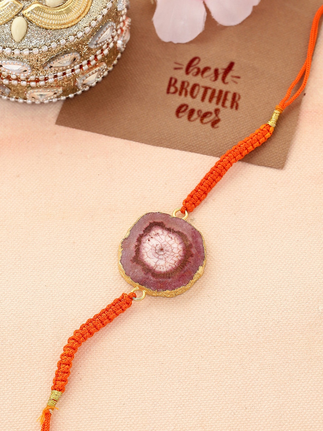 

Shoshaa Men Orange Semi Precious Agate Studded 14kt Gold Foil Border Rakhi