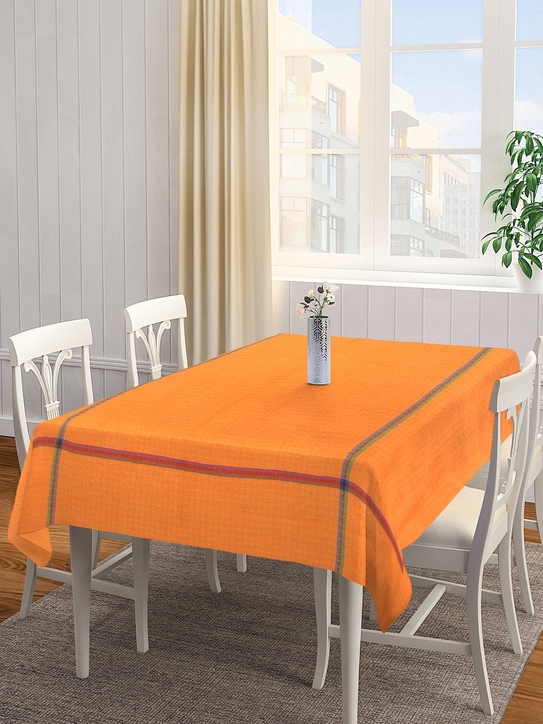 

KLOTTHE Orange Solid 6-Seater Rectangular Table Cover
