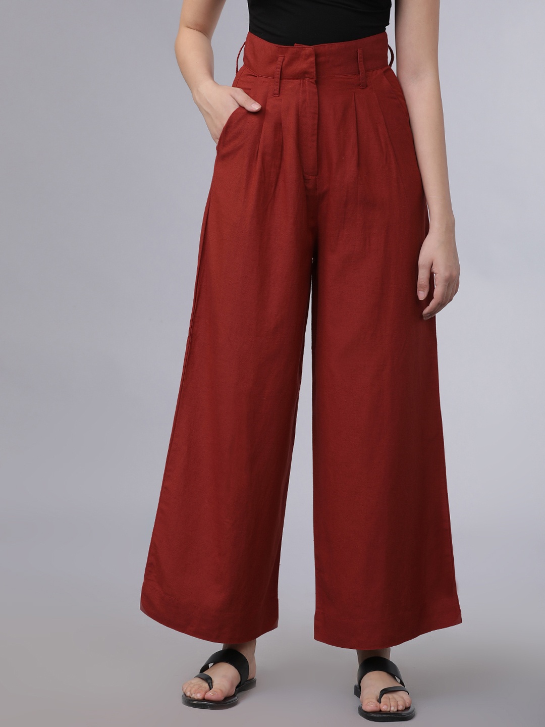 

Tokyo Talkies Women Brown Flared Solid Regular Trousers
