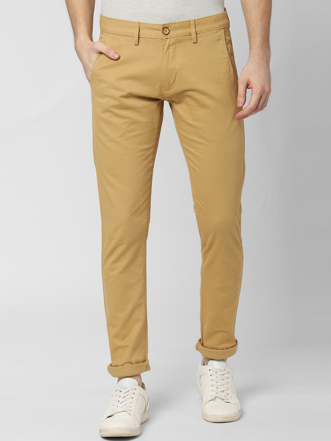 

Peter England Casuals Men Beige Skinny Fit Solid Regular Trousers