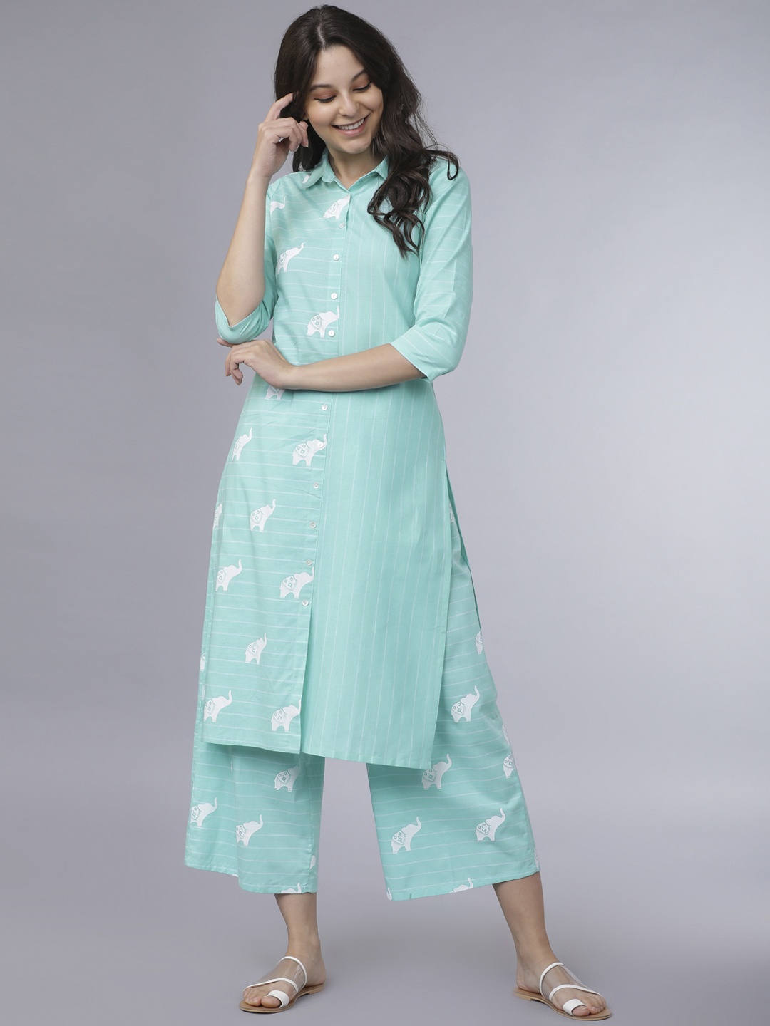 

Vishudh Women Sea Green Striped Kurta with Palazzos