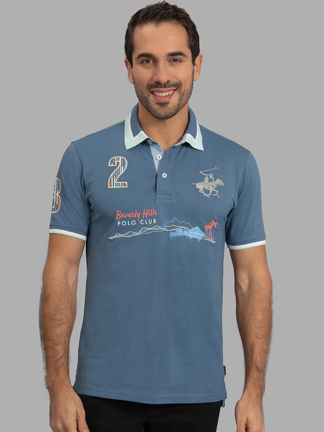 

Beverly Hills Polo Club Men Blue Self Design Polo Collar T-shirt