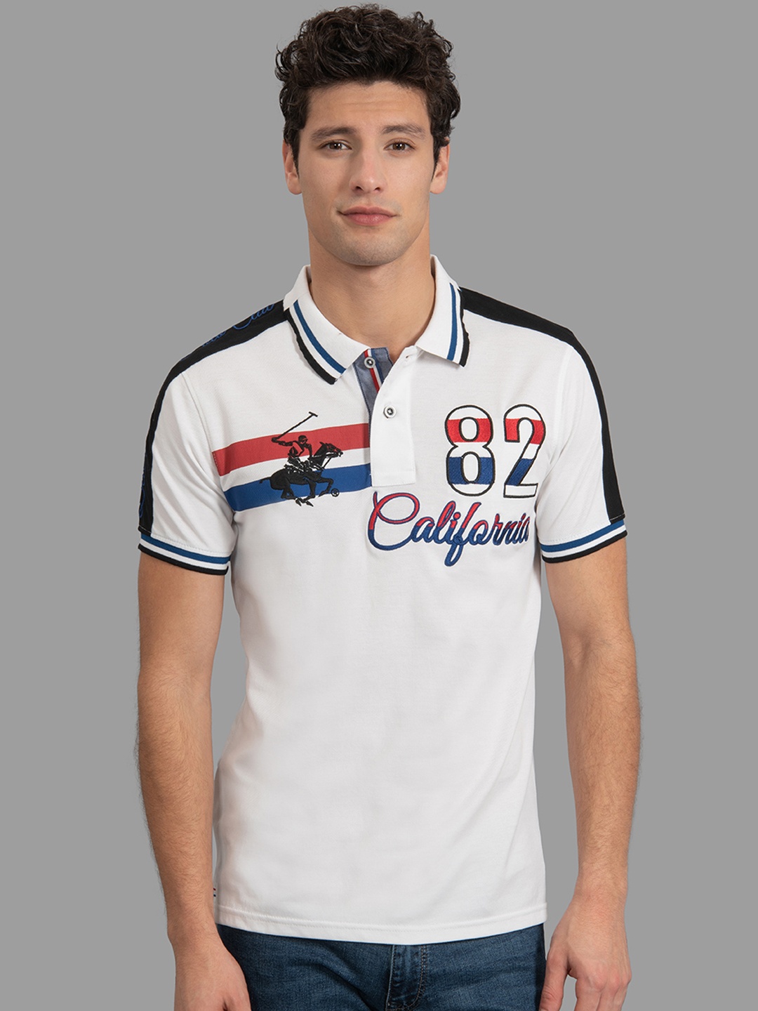 

Beverly Hills Polo Club Men White & Navy Blue Self Design Polo Collar T-shirt