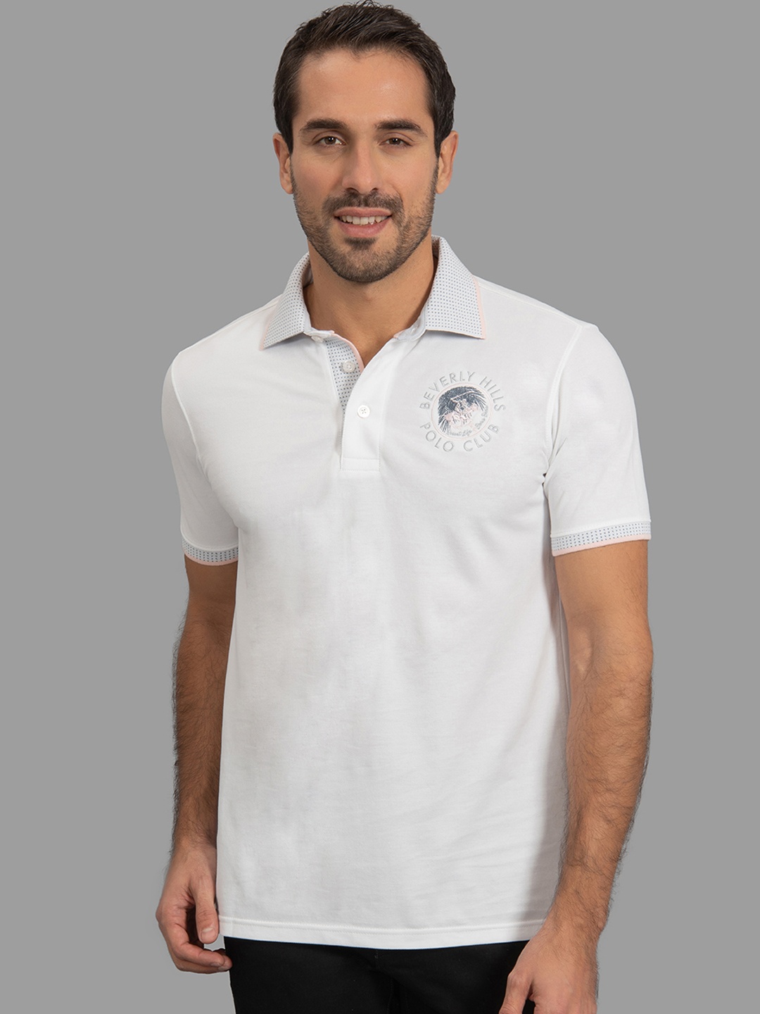 

Beverly Hills Polo Club Men White Solid Polo Collar T-shirt