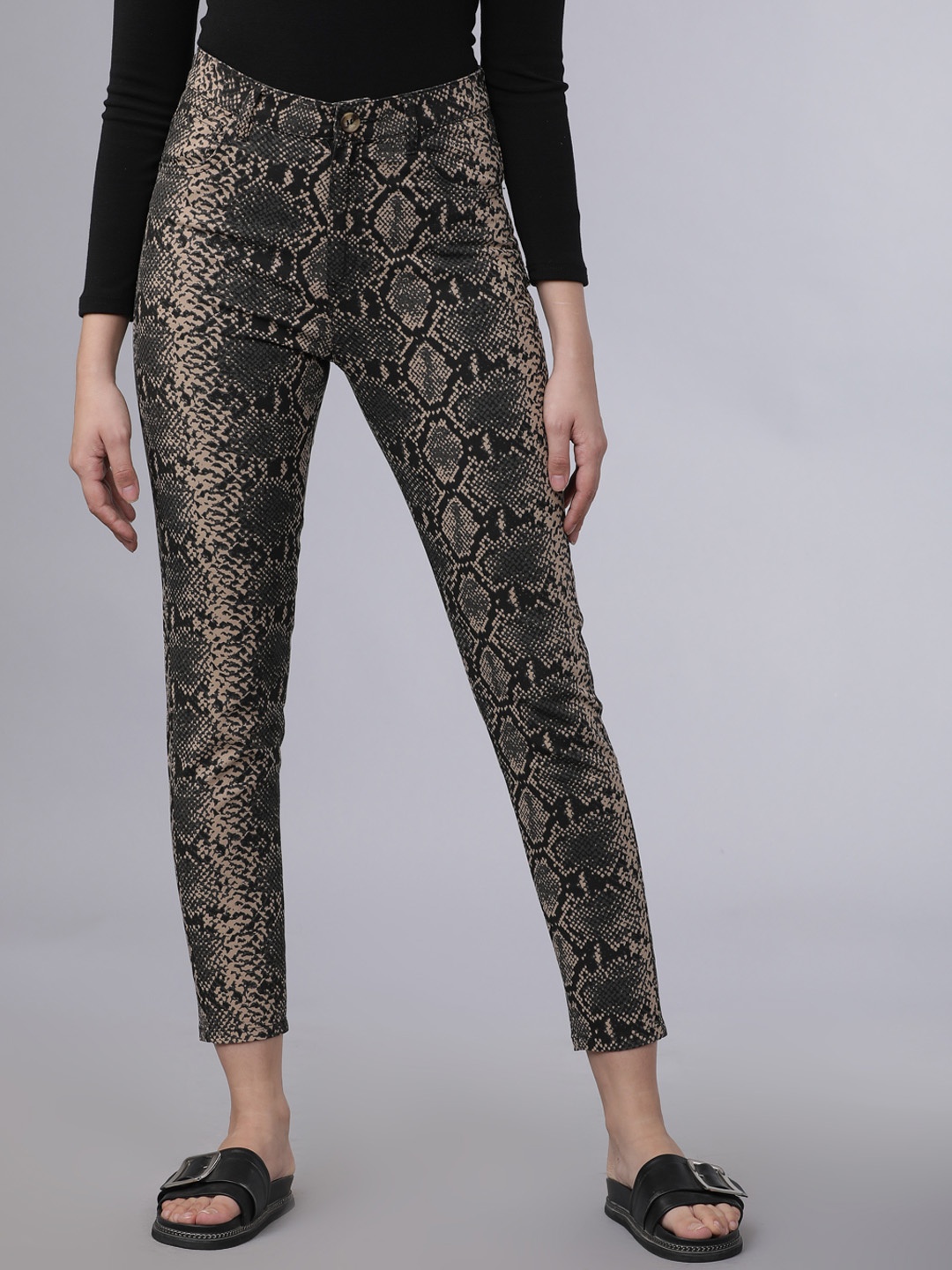 

Tokyo Talkies Women Beige Skinny Fit Printed Regular Trousers