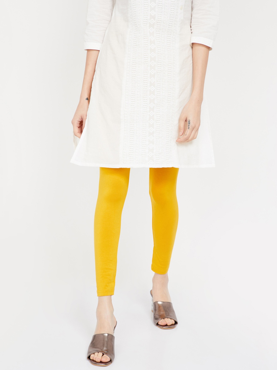 

Melange by Lifestyle Women Mustard Yellow Solid Ankle-Length Leggings