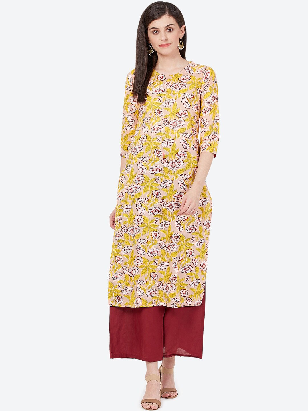 

Meeranshi Women Yellow & Maroon Floral Printed Kurta with Palazzos
