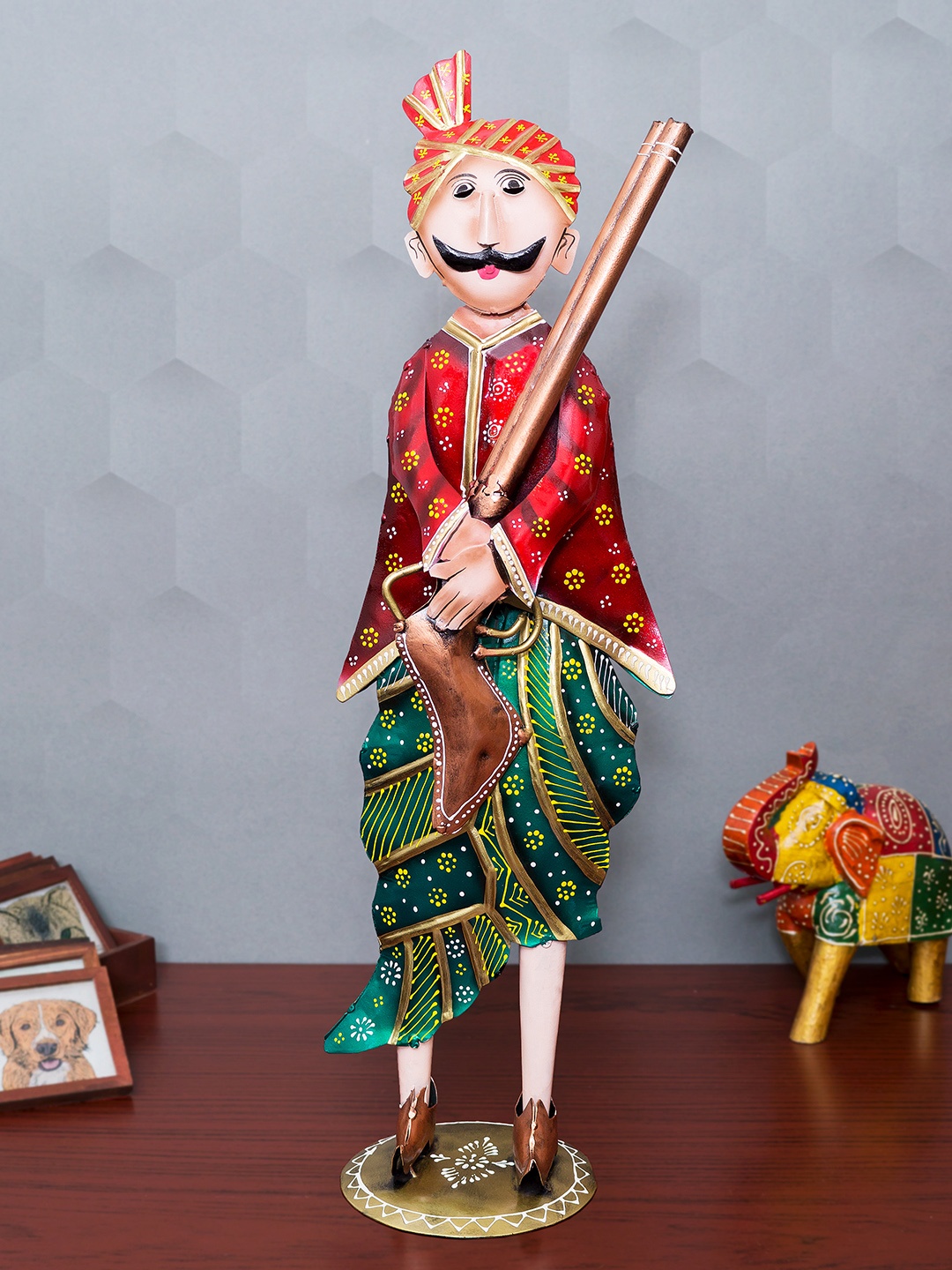 

Golden Peacock Red & Green Handcrafted Indian Village Man Figurine