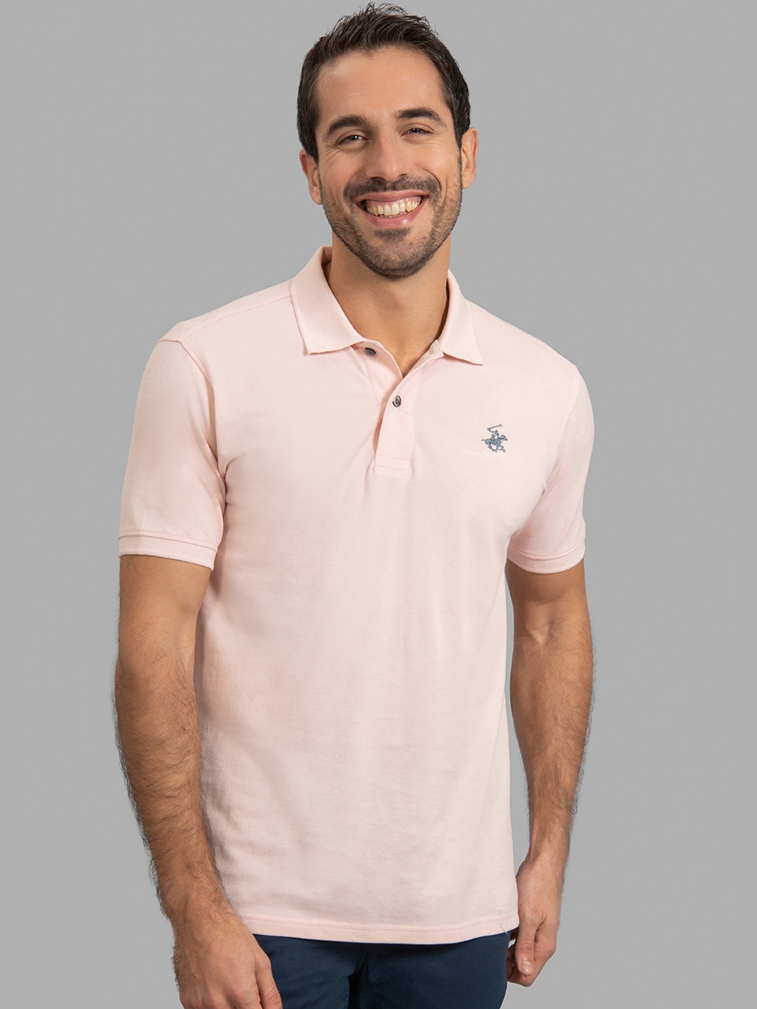 

Beverly Hills Polo Club Men Pink Solid Polo Collar T-shirt