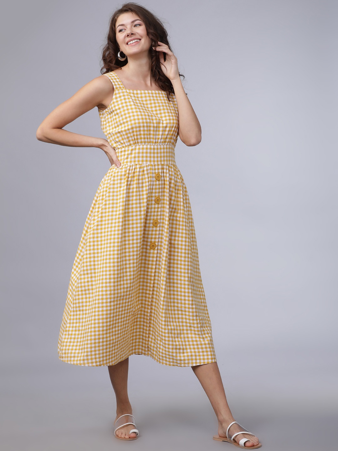 

Tokyo Talkies Women Yellow Printed Fit and Flare Dress