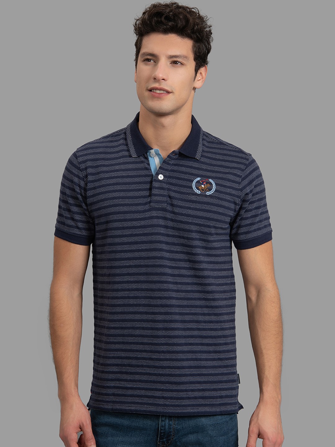 

Beverly Hills Polo Club Men Navy Blue Striped Polo Collar T-shirt